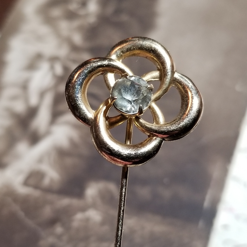 Vintage love knot stick pin gold tone clear rhinestone Victorian pinwheel